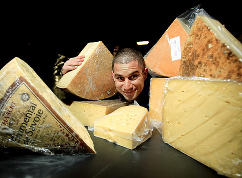 Adam Moskowitz, President of Larkin Inc., pose for photos with differnt kids of cheeses on Wednesday, June 23, 2010. Adam will be hosting Cheesemonger Invitational Competition inside his building located at 47-55 27th Avenue in Long Island City, Queens. Original Filename: _H4G9812.JPG