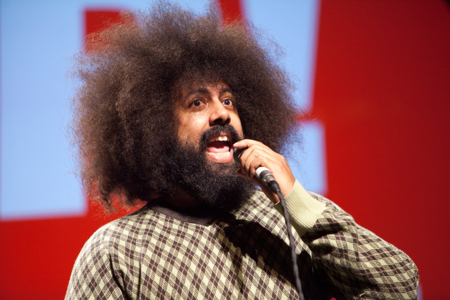 Reggie Watts performs on stage as the final presenter of PopTech 2011, on Saturday night