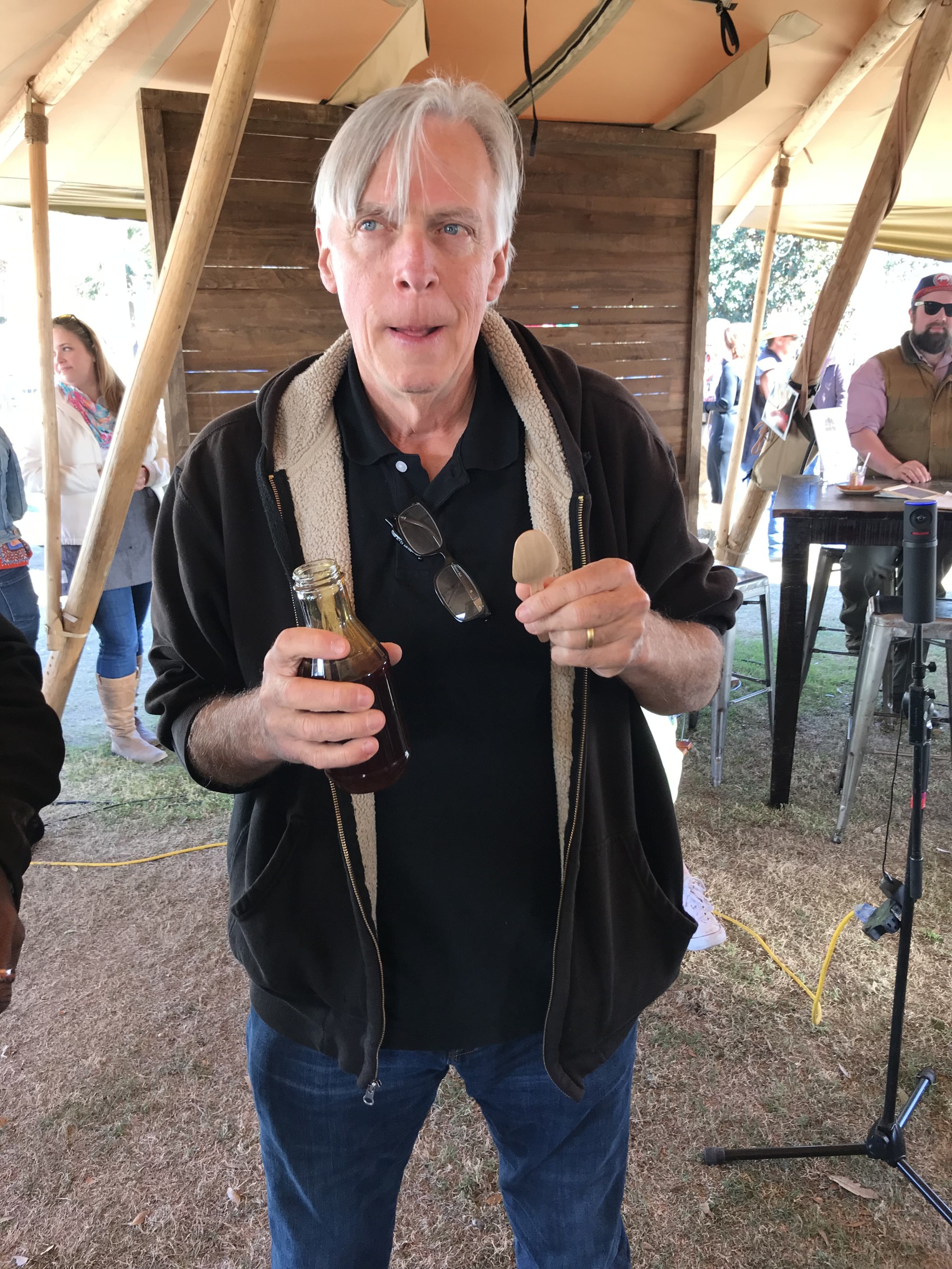 Glenn Roberts samples some cane syrup 